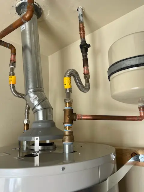 Water heater installation and plumbing repair in Port-au-Peck